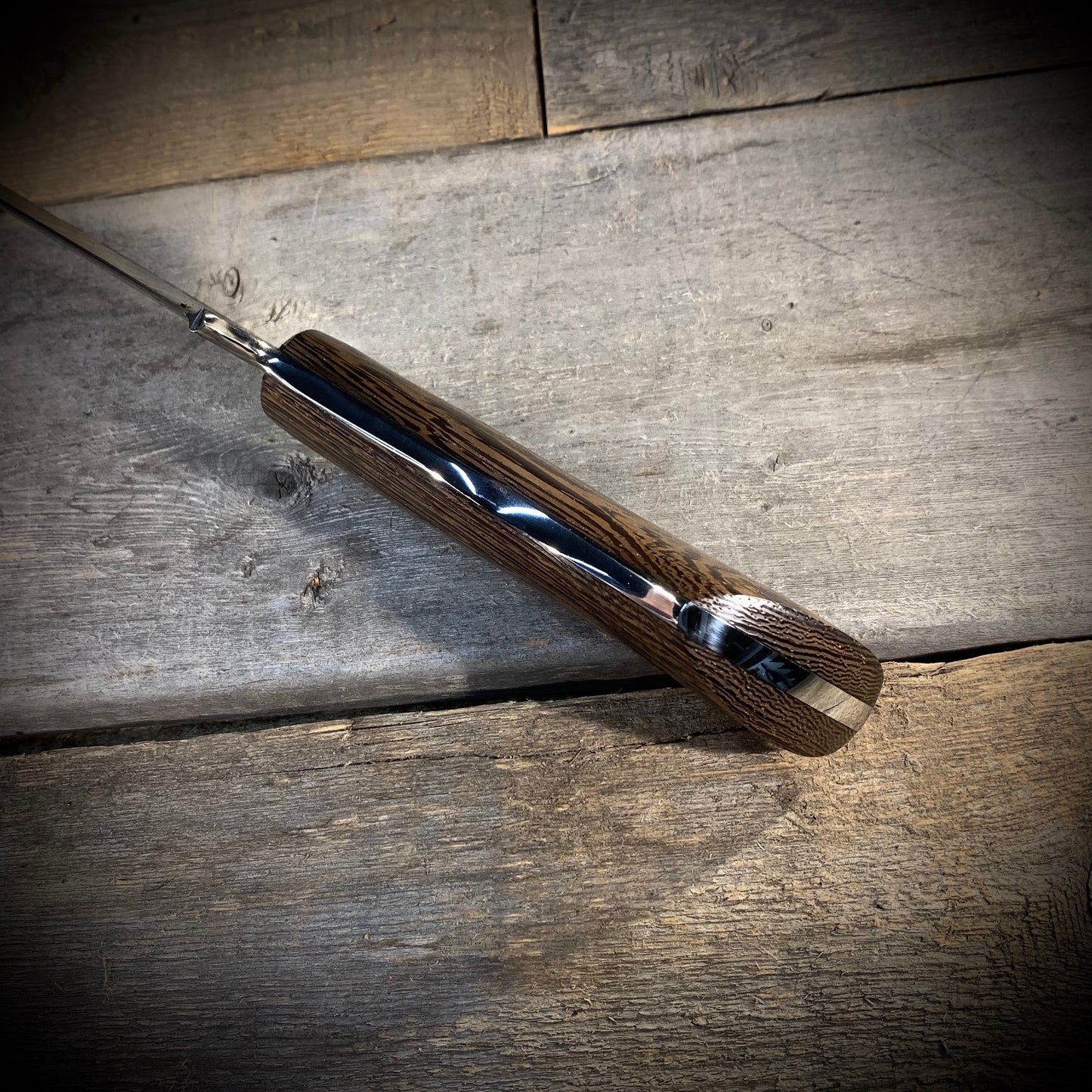Hand Forged 1095 High Carbon Steel Hunting Knife, handmade in Winnipeg Canada by Blacksmith Graeson Fehr. Kydex or hand tooled leather sheath options.