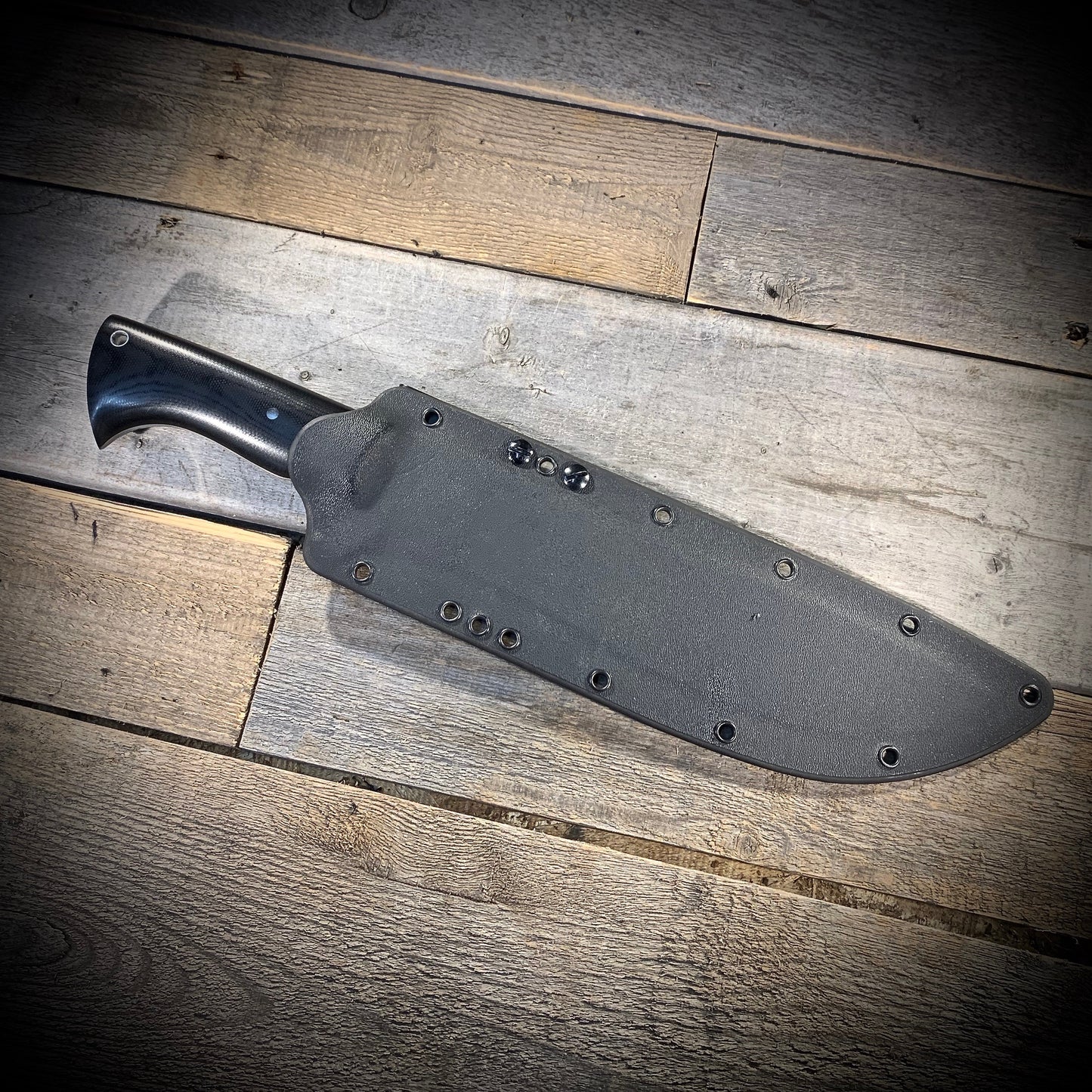 Hand Forged 1095 High Carbon Steel Hunting Knife, handmade in Winnipeg Canada by Blacksmith Graeson Fehr. Kydex or hand tooled leather sheath options.