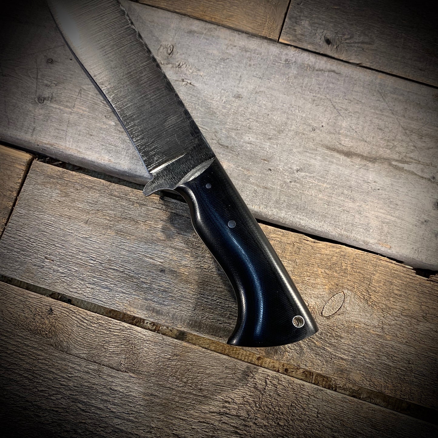 Hand Forged 1095 High Carbon Steel Hunting Knife, handmade in Winnipeg Canada by Blacksmith Graeson Fehr. Kydex or hand tooled leather sheath options.