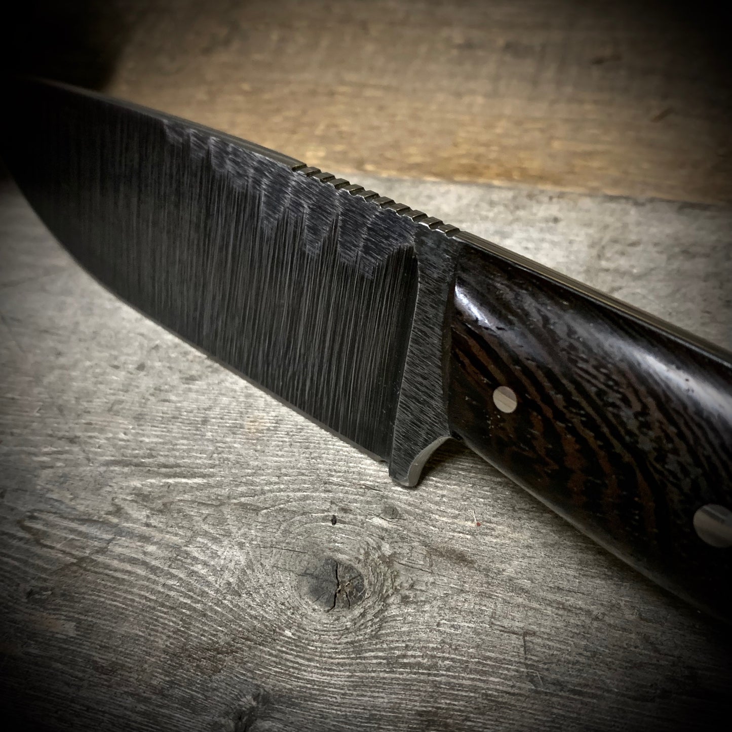 Hand Forged 1095 High Carbon Steel Hunting Knife, handmade in Winnipeg Canada by Blacksmith Graeson Fehr. Kydex or hand tooled leather sheath options.