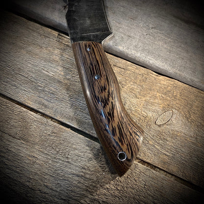 Hand Forged 1095  High Carbon Steel Hunting Knife, handmade in Winnipeg Canada by Blacksmith Graeson Fehr. Kydex or hand tooled leather sheath options.