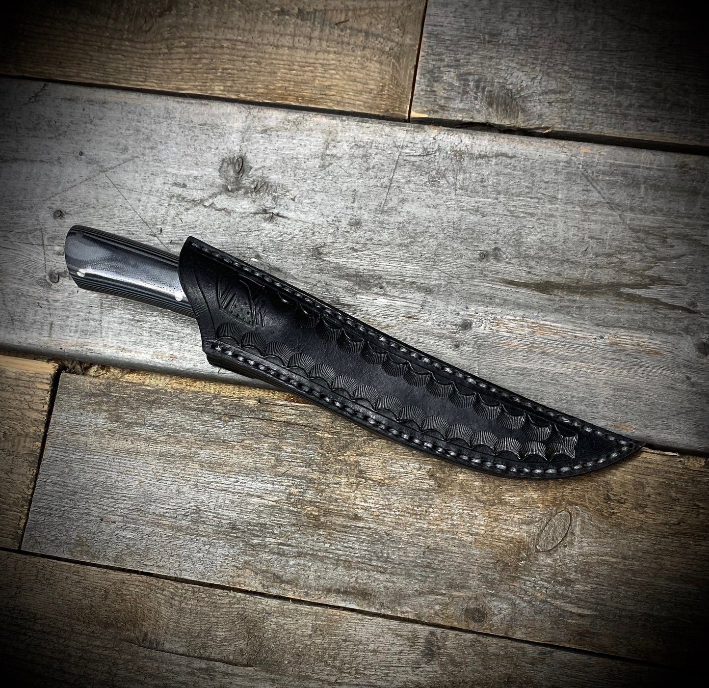 Hand Forged 1095  High Carbon Steel Hunting Knife, handmade in Winnipeg Canada by Blacksmith Graeson Fehr. Kydex or hand tooled leather sheath options.