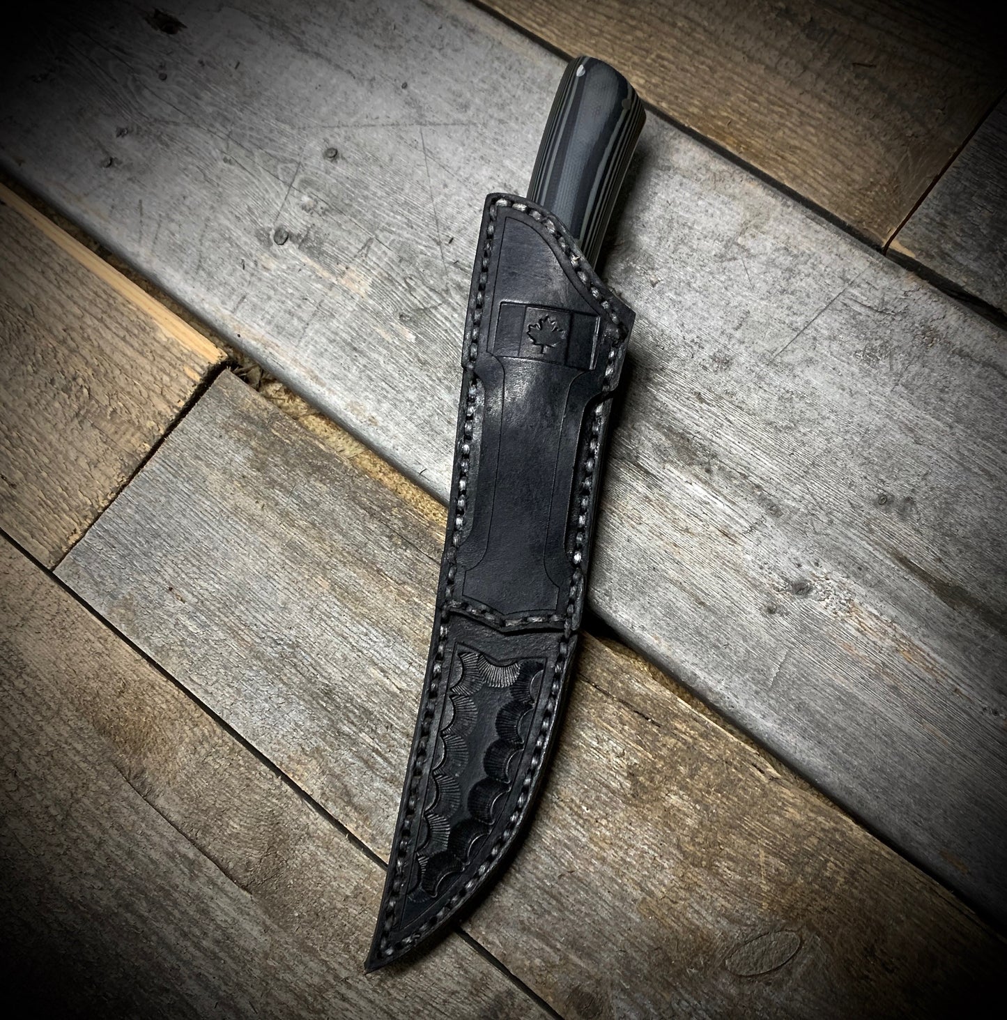 Hand Forged 1095  High Carbon Steel Hunting Knife, handmade in Winnipeg Canada by Blacksmith Graeson Fehr. Kydex or hand tooled leather sheath options.