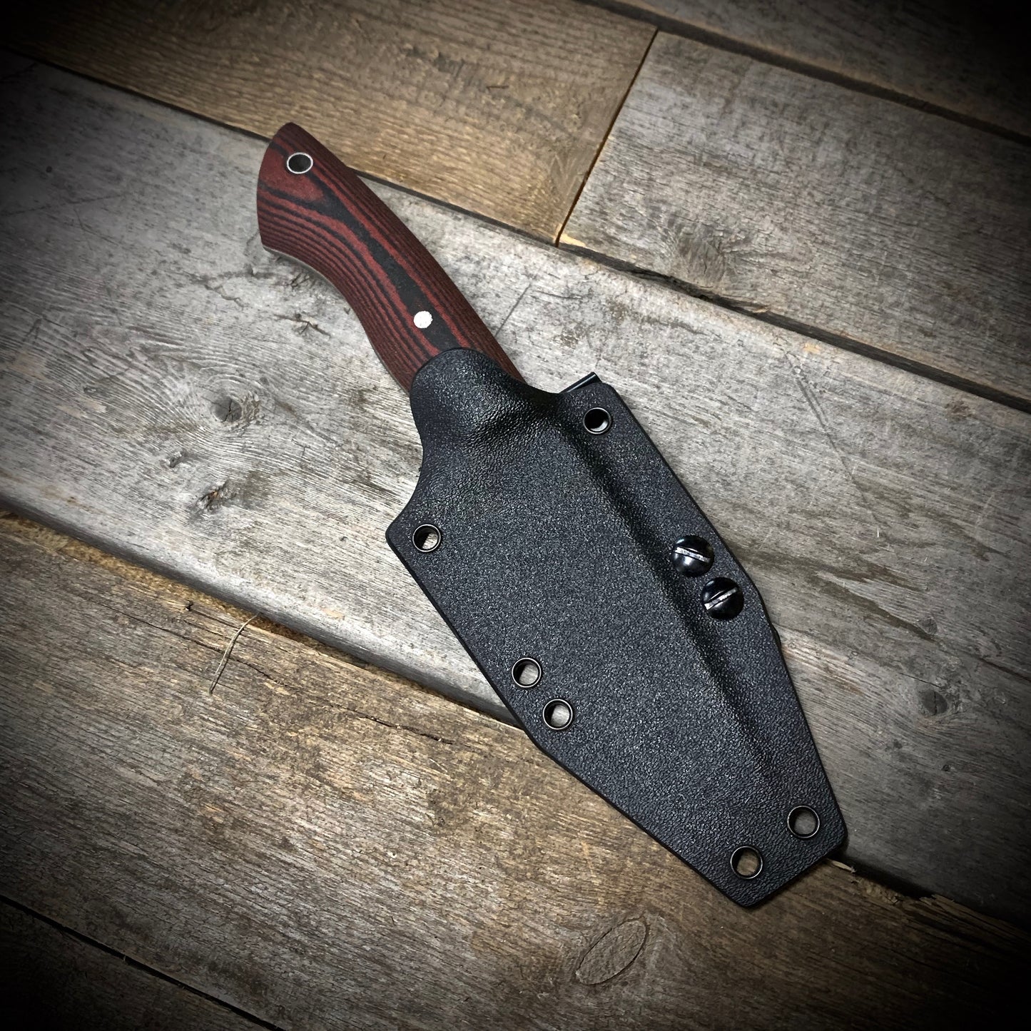 Hand Forged 1095  High Carbon Steel Hunting Knife, handmade in Winnipeg Canada by Blacksmith Graeson Fehr. Kydex or hand tooled leather sheath options.