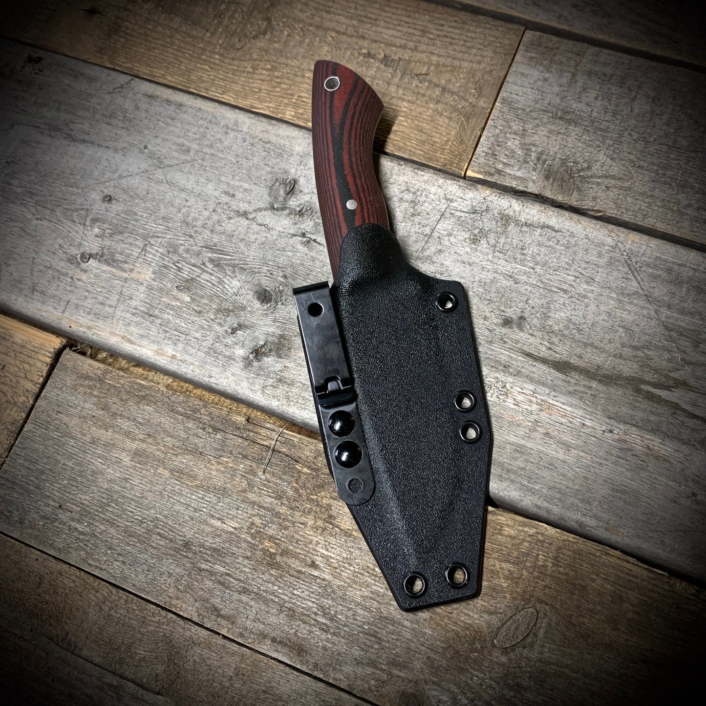 Hand Forged 1095  High Carbon Steel Hunting Knife, handmade in Winnipeg Canada by Blacksmith Graeson Fehr. Kydex or hand tooled leather sheath options.